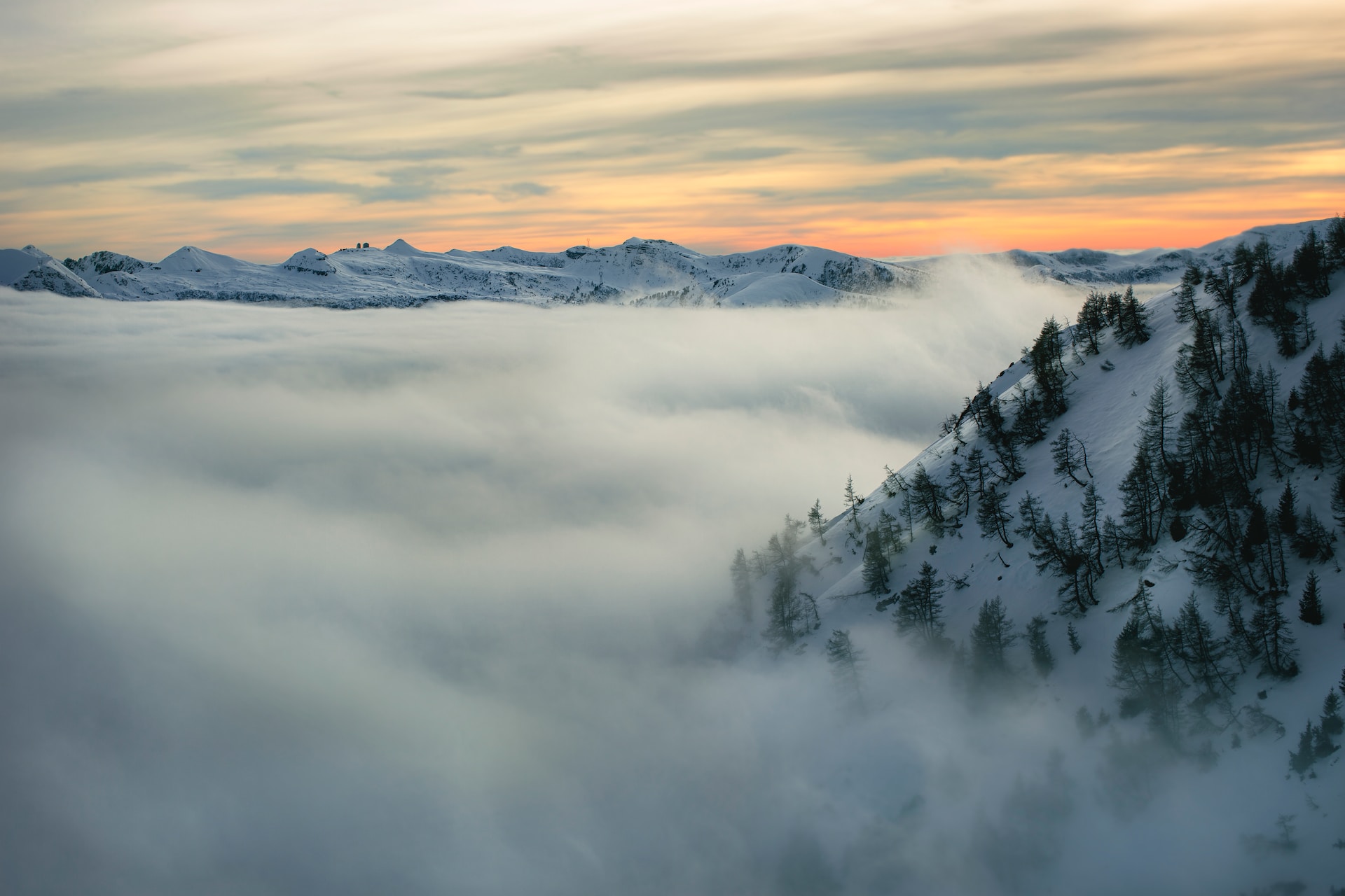 Photo of mountains covered with snow by Nico M.